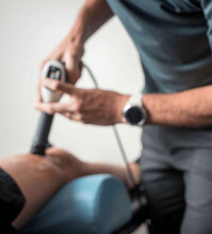 PT Shock Therapy gun on leg